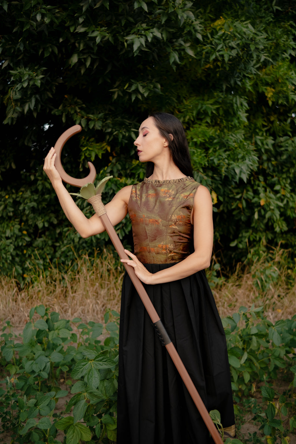 Handmade alder wood fantasy staff with jute rope wrapping and green leaf accents
