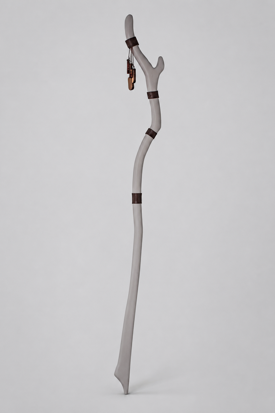 Woodland rune staff with curved gray wooden silhouette and leather accent
