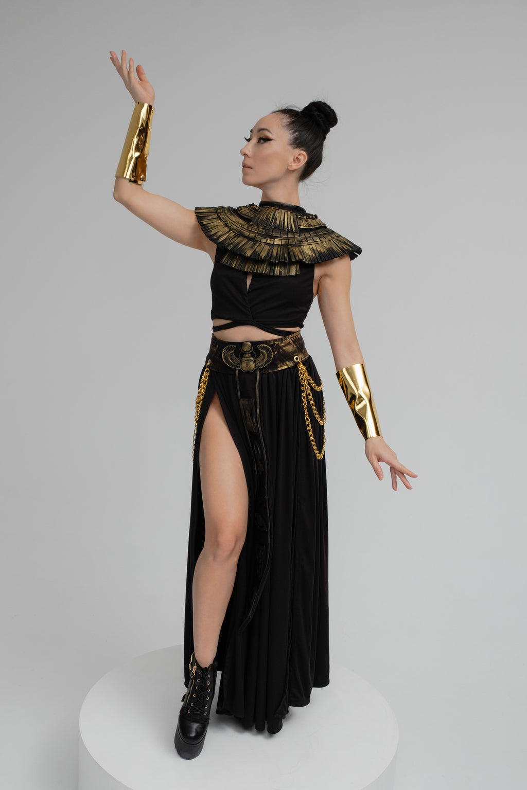 Black fantasy dress with gold arm cuffs priestess costume