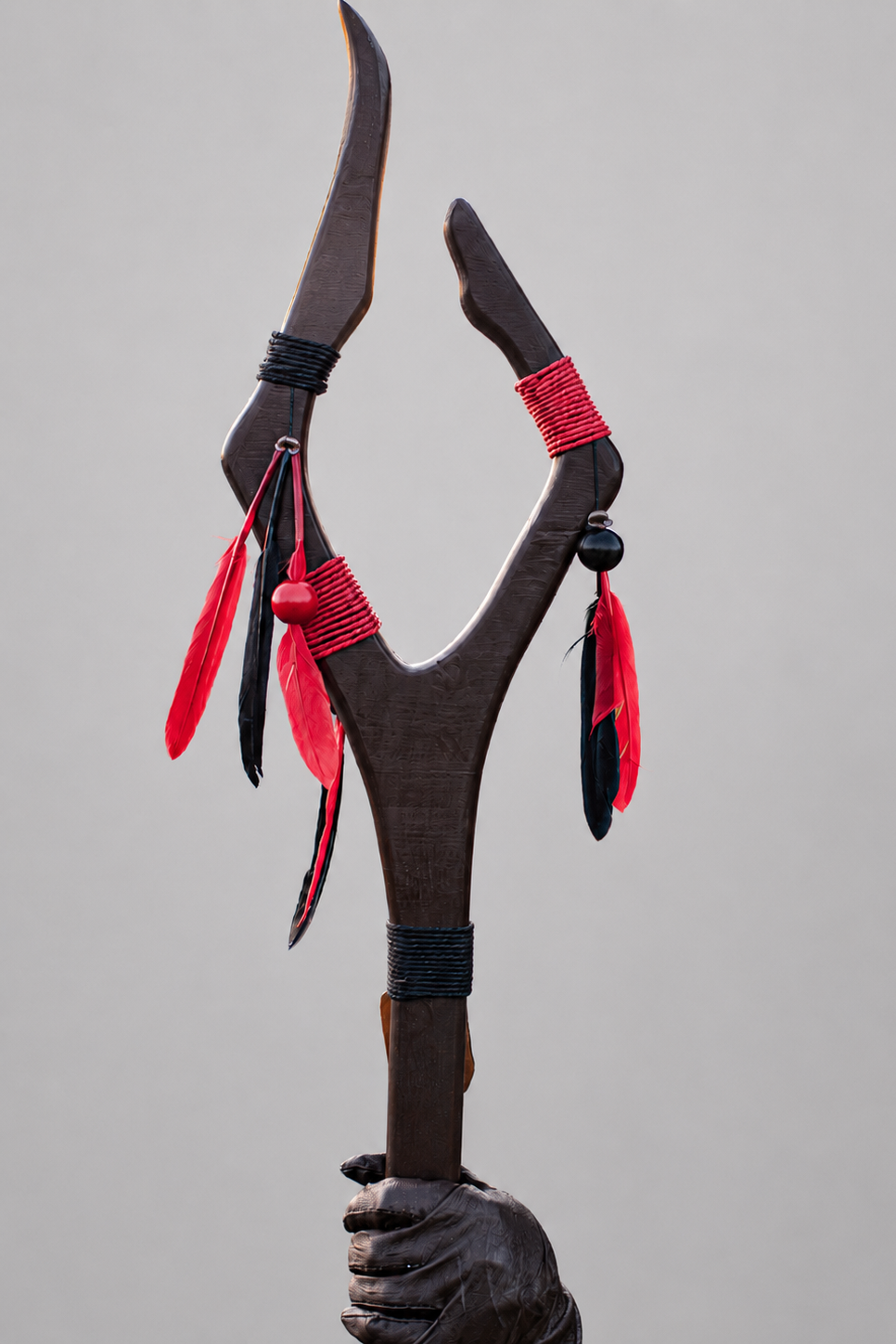 Handmade alder wood staff with feathers, wooden beads and satin rope wrapping