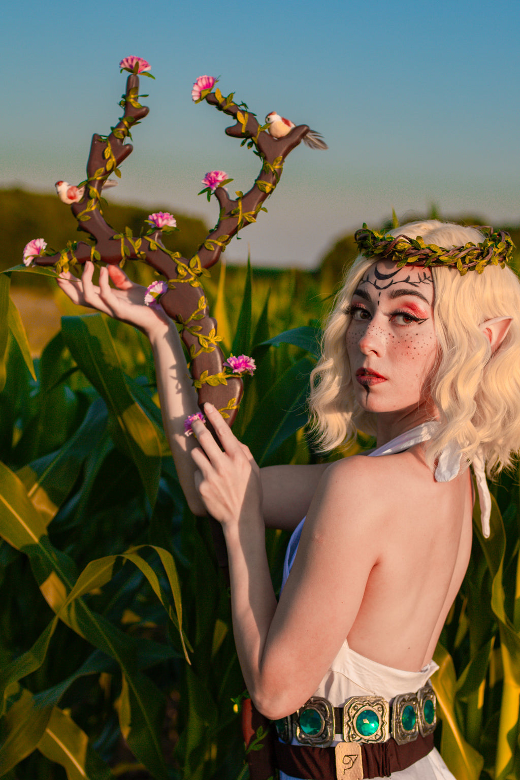 Aviary Blossom Staff with bird- and flower-inspired decorative design