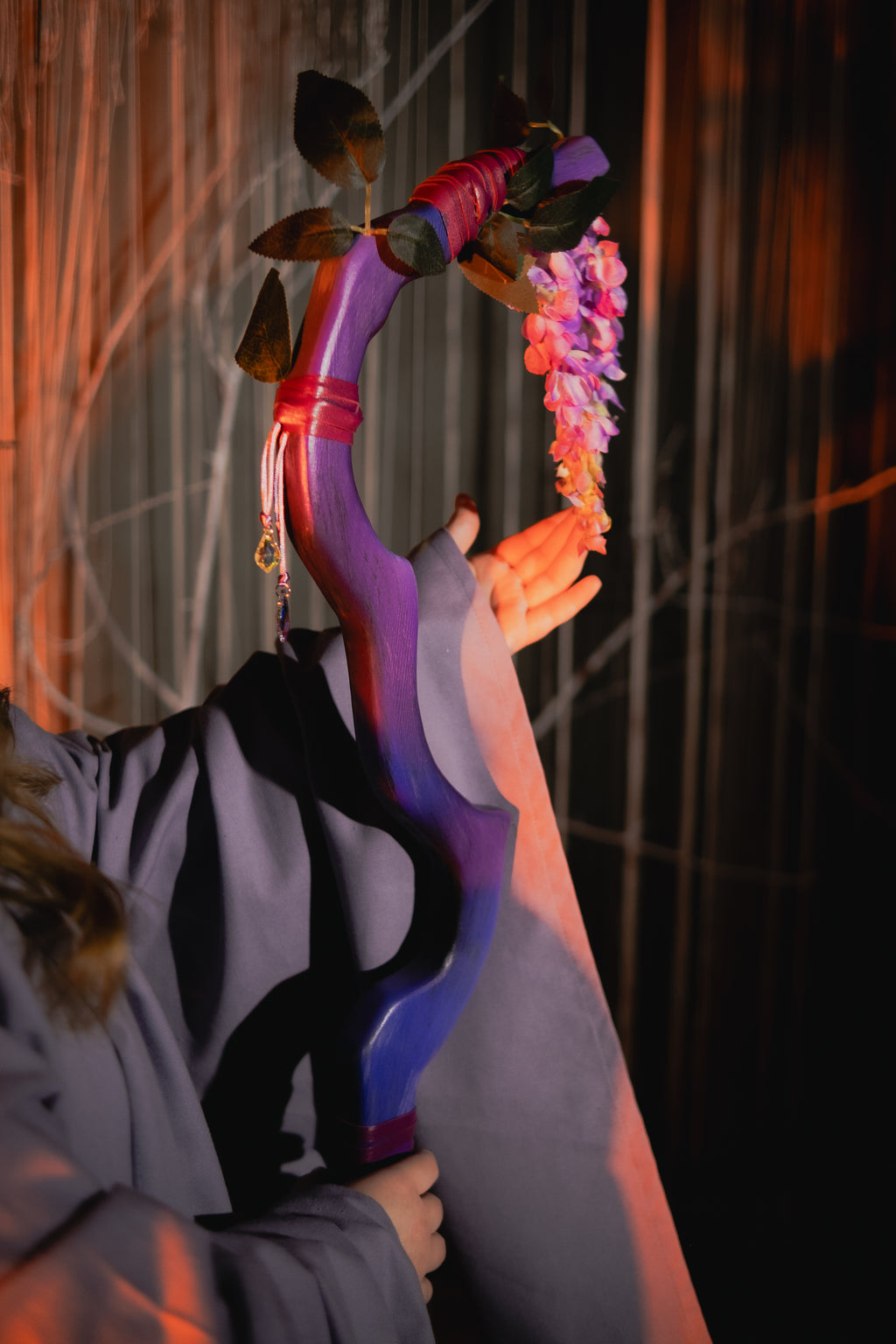 Lavender fantasy staff with organic wooden shape and botanical accents