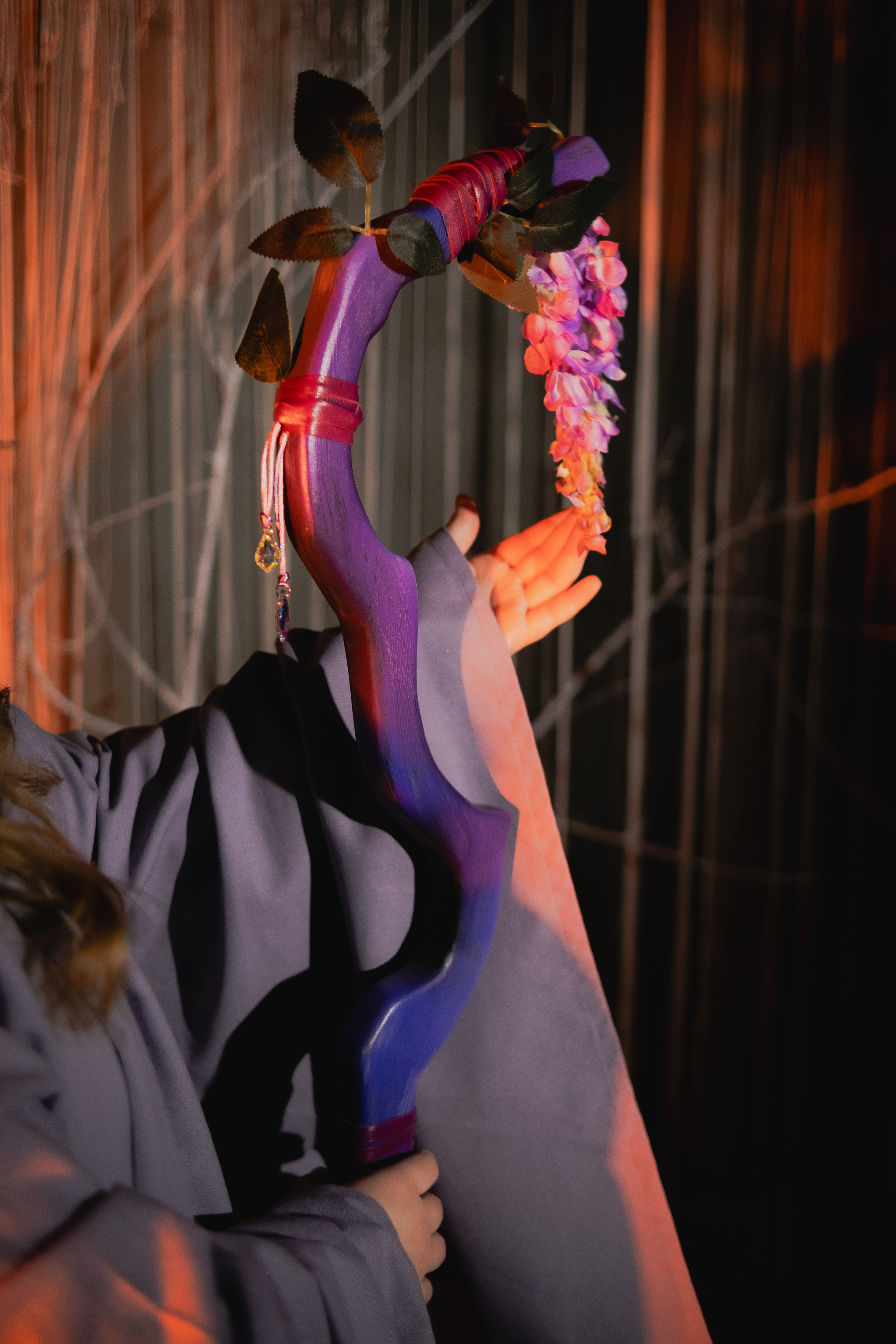 Lavender fantasy staff with organic wooden shape and botanical accents