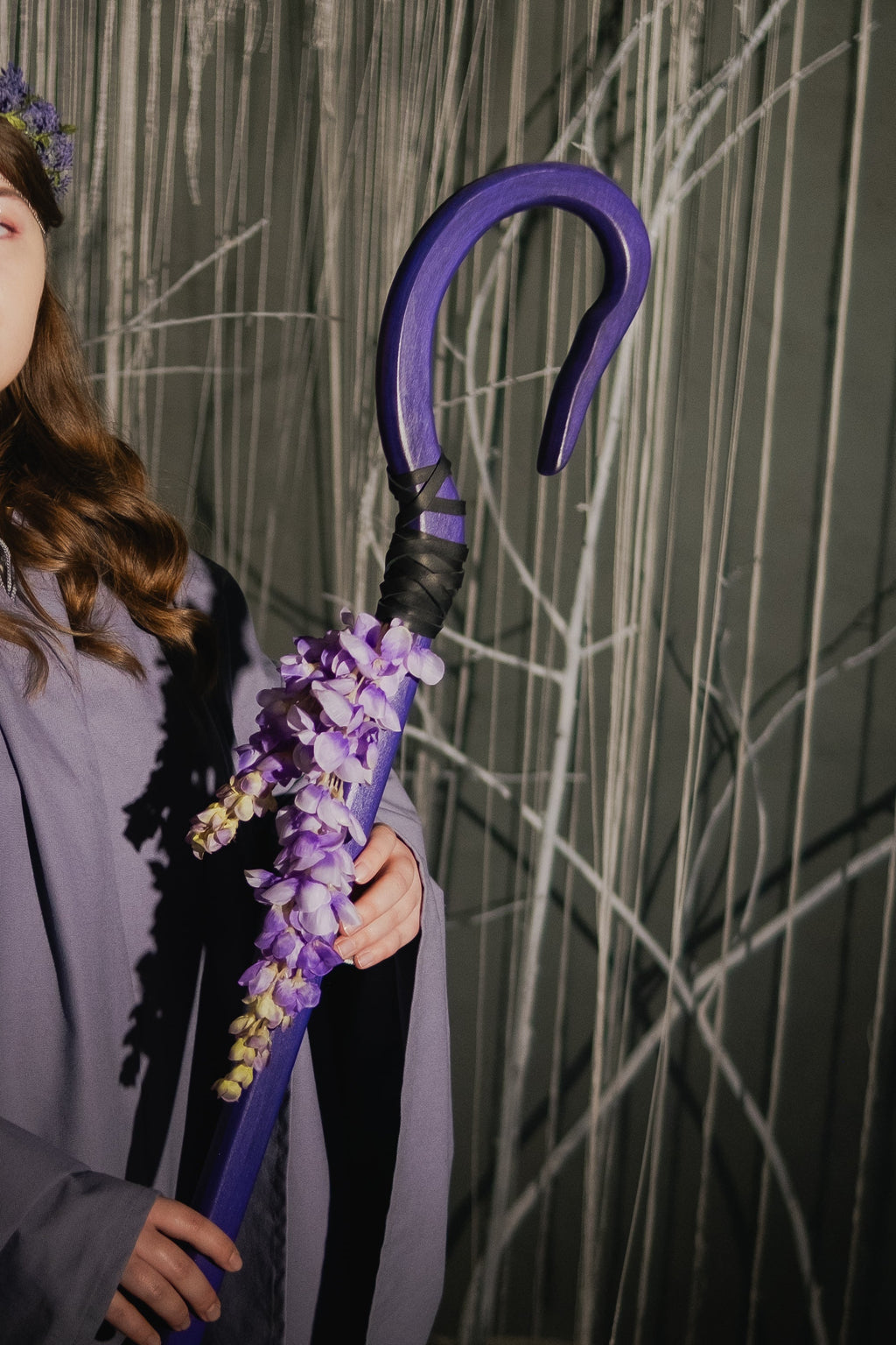 Violet floral fantasy staff with cascading wisteria style flowers