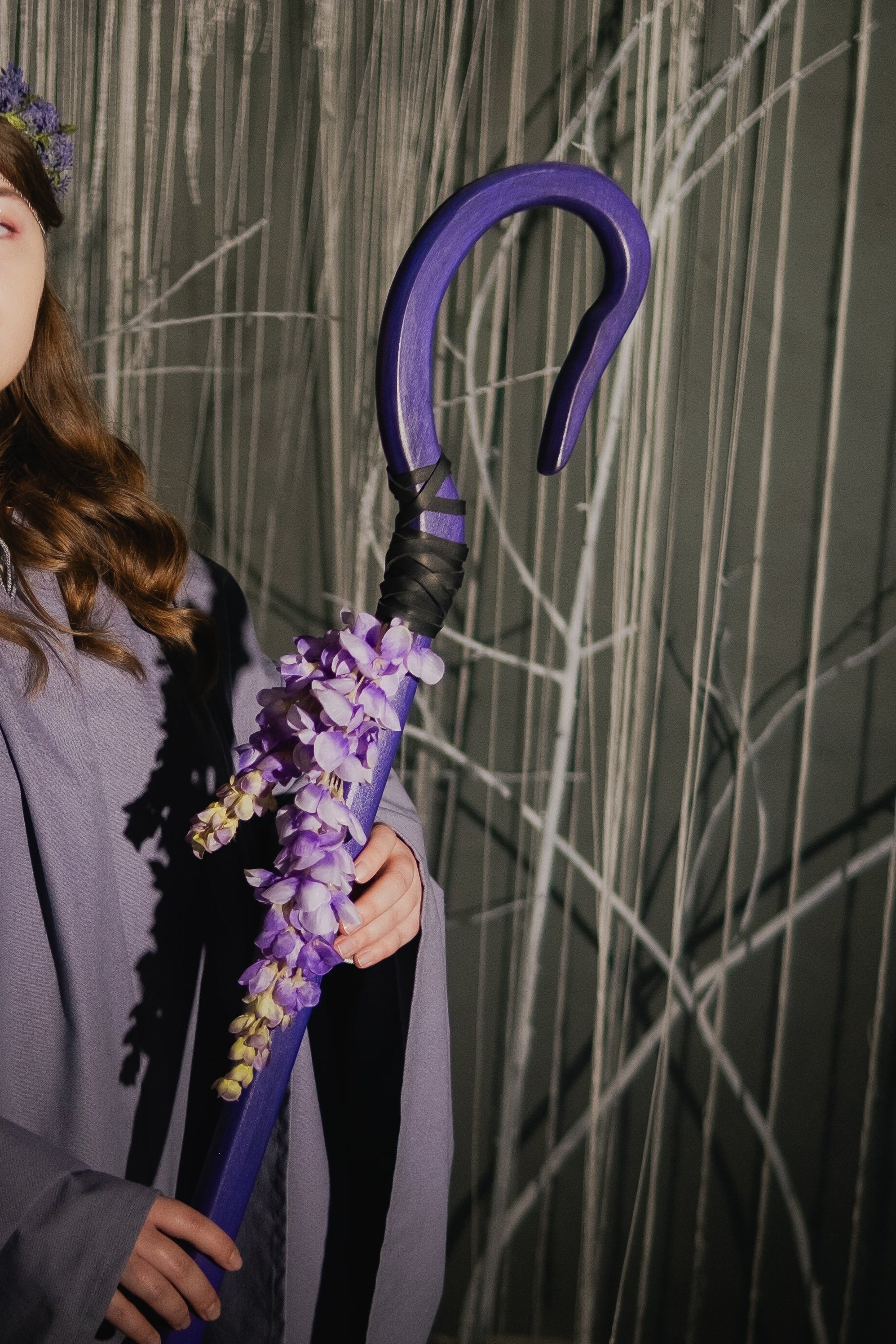 Violet floral fantasy staff with cascading wisteria style flowers